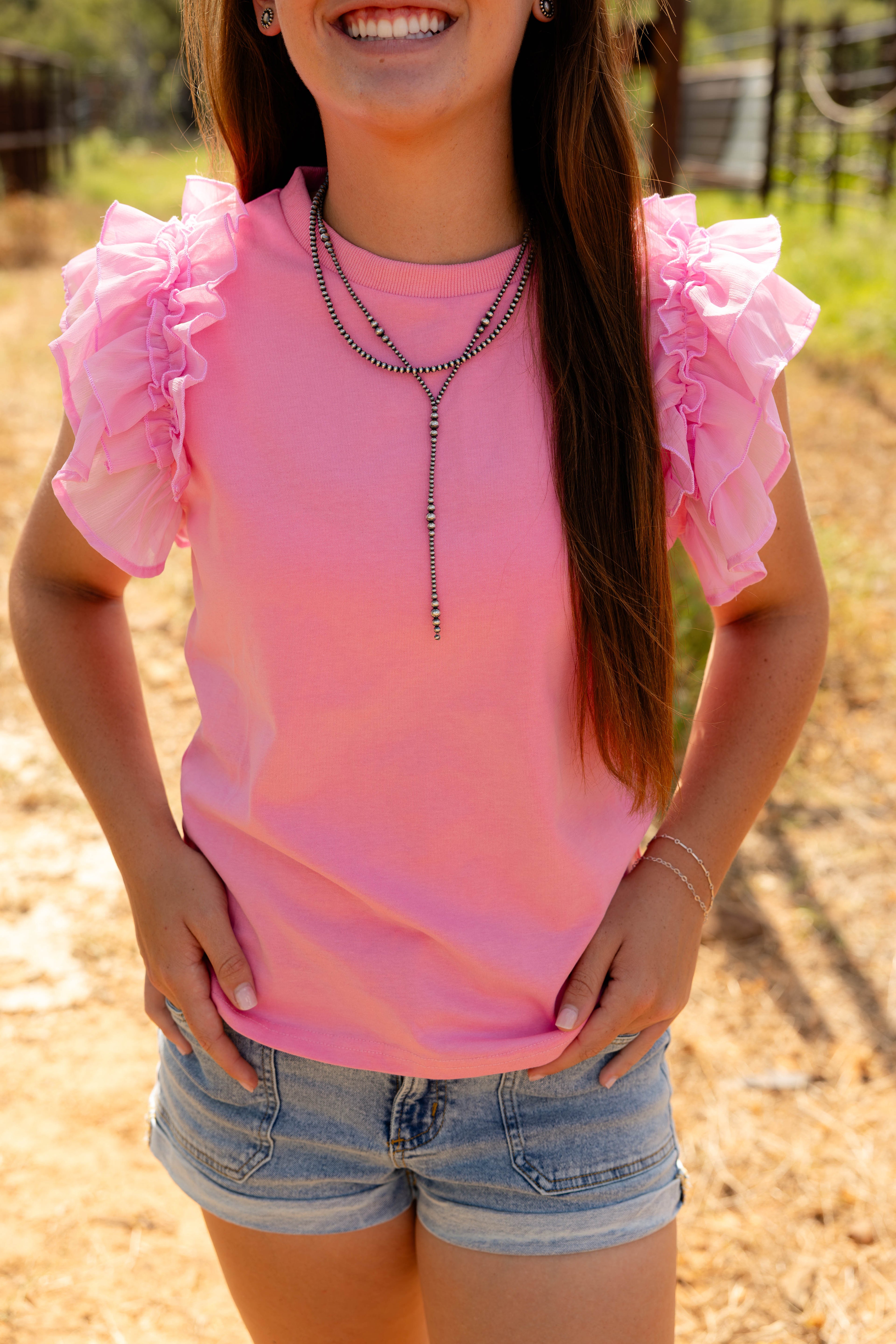 pink rodeo ruffles top